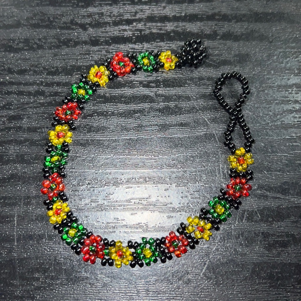 Beaded flower bracket
